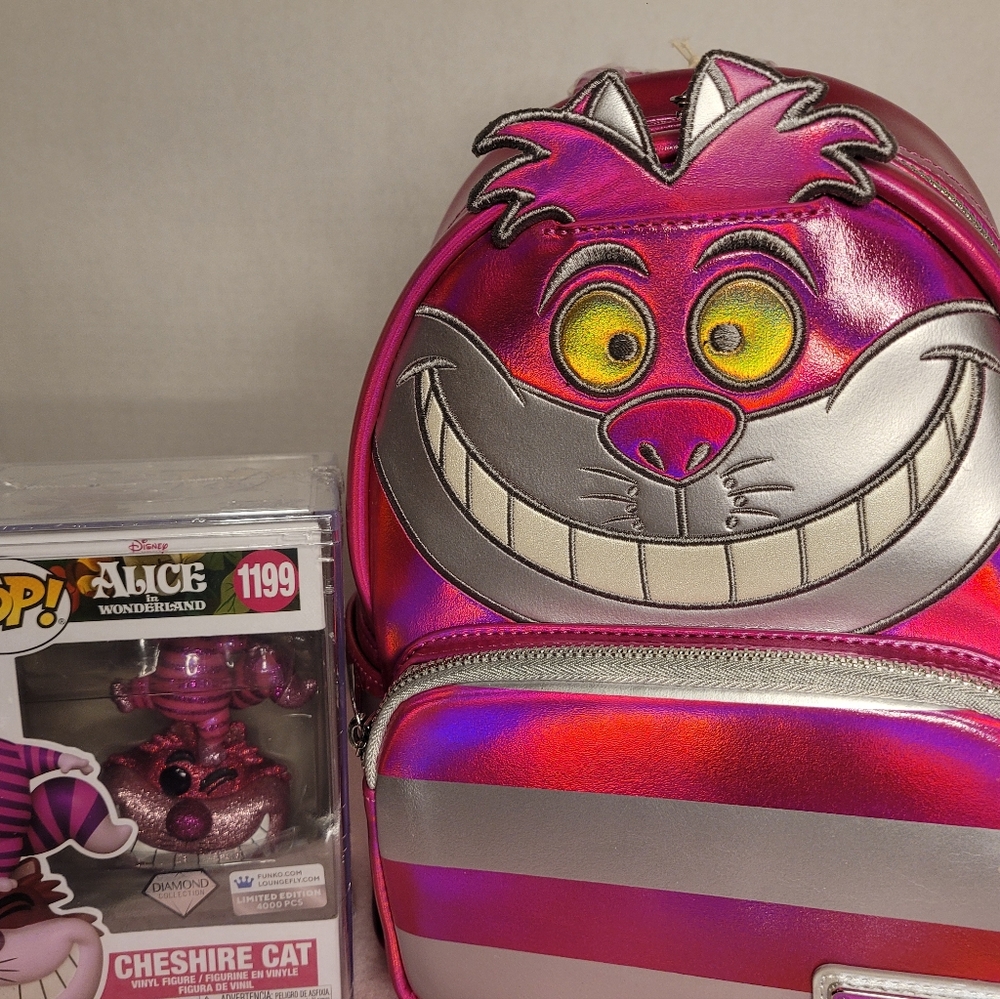 Platinum Cheshire Cat and FUNKO Pop